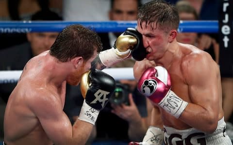 Canelo lands a punch on GGG - Credit: Las Vegas Sun