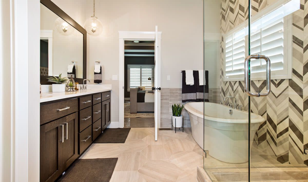 A modern bathroom with updated features and two vanities