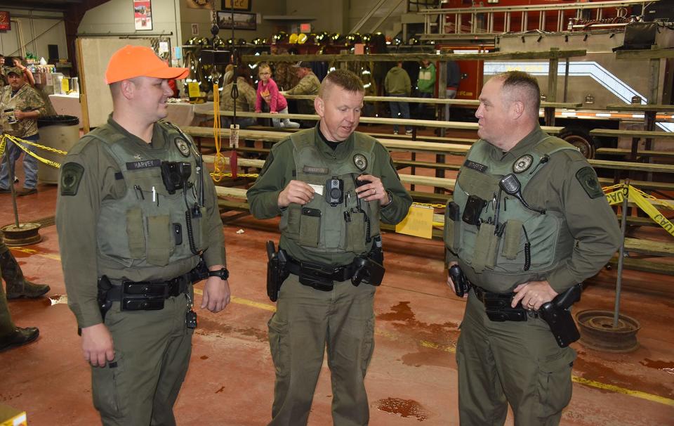 A handful of black bears were receive Nov. 21, 2021, at the New Centerville and Rural Volunteer Fire Co. fire hall check station for the Pennsylvania Game Commission. Wardens, from left, Andy Harvey, Travis Anderson and Brian Witherite, talk about the hunting season which runs through Nov. 23, 2021, and reopens in some parts of the state on Saturday.
