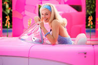 <p>Robbie looks totally retro in the <a href="https://people.com/movies/see-a-first-look-photo-of-margot-robbie-as-barbie-in-the-barbie-movie-due-out-next-year/" rel="nofollow noopener" target="_blank" data-ylk="slk:first look at the Barbie movie;elm:context_link;itc:0;sec:content-canvas" class="link ">first look at the <em>Barbie</em> movie</a>, and it's not just because of her pink convertible. Because Barbie is a total fashionista, she perfectly combines a striped halter with a polka dot headband. </p>