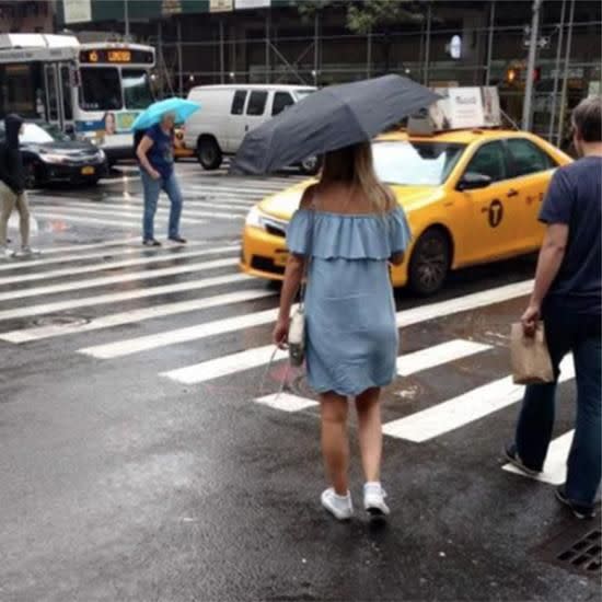 Here's someone wearing the dress crossing the road in New York. Photo: Facebook