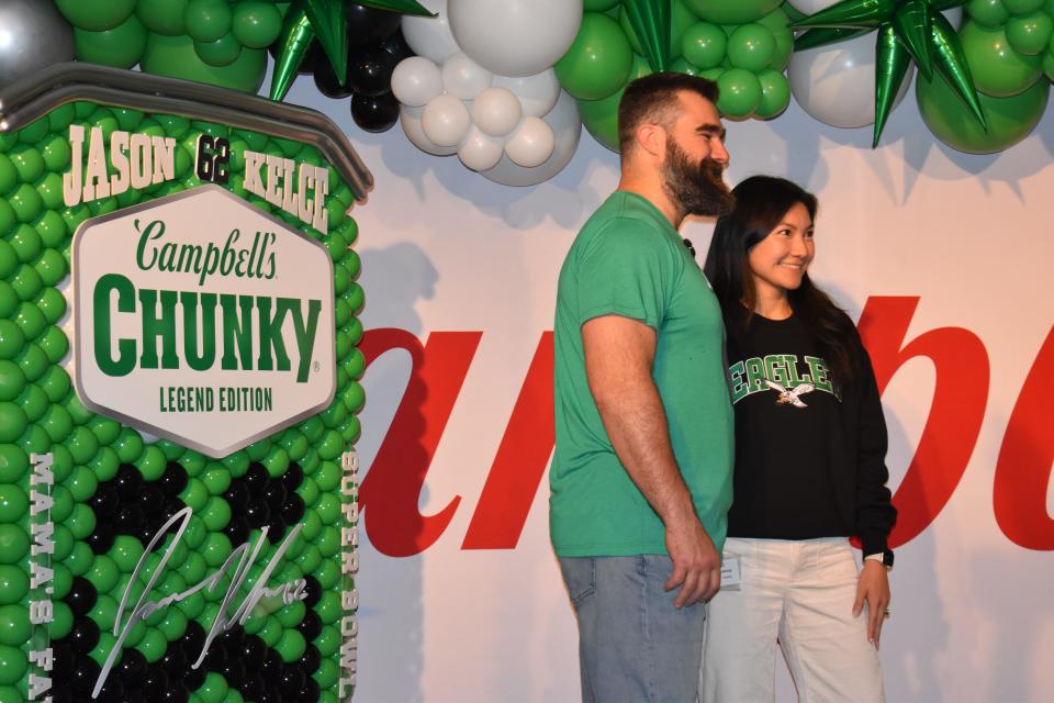 Jason Kelce poses with a Campbell Soup Co. employee during a March 20 visit to the company's Camden headquarters.