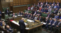 British Prime Minister Boris Johnson speaking in the House of Commons, London during the debate for the European Union Withdrawal Agreement Bill: Second Reading. Tuesday, Oct. 22, 2019. British Prime Minister Boris Johnson's European Union divorce bill faces two votes Tuesday, with lawmakers first being asked to approve it in principle, followed by a vote on the government's schedule for debate and possible amendments. (House of Commons/via AP)