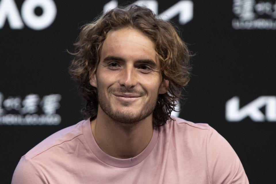 Stefanos Tsitsipas of Greece reacts during a press conference ahead of the Australian Open tennis championships in Melbourne, Australia, Saturday, Jan. 15, 2022. (AP Photo/Simon Baker)
