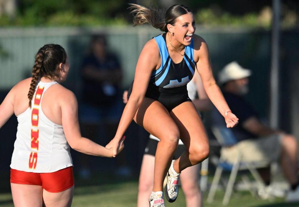 Clovis North’s Loie Madsen, right, celebrates her latest throw for the Girls Discus at the 2023 CIF California Track & Field State Championship finals Saturday, May 27, 2023 in Clovis.