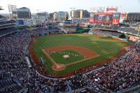 <p>A photo of House Majority Whip Steve Scalise, R-La., is seen on the video board as the last member of the Republican team announced before the Congressional baseball game, Thursday, June 15, 2017, in Washington. (Photo: Alex Brandon/AP) </p>