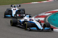 FILE PHOTO: Formula One F1 - Chinese Grand Prix - Shanghai International Circuit, Shanghai, China - April 14, 2019 Williams' George Russell and Williams' Robert Kubica in action during the race REUTERS/Thomas Peter
