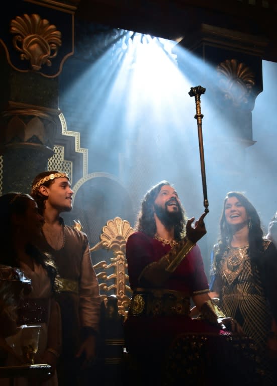 Actors perform during the shooting of "O Rico e Lazaro" (The Rich Man and Lazarus) soap opera at the studios of Record TV in Rio de Janeiro