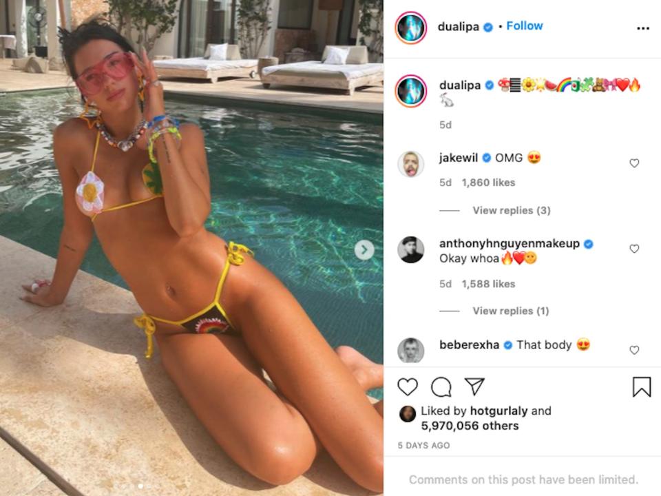 Dua Lipa leans in a crochet bikini by a pool.