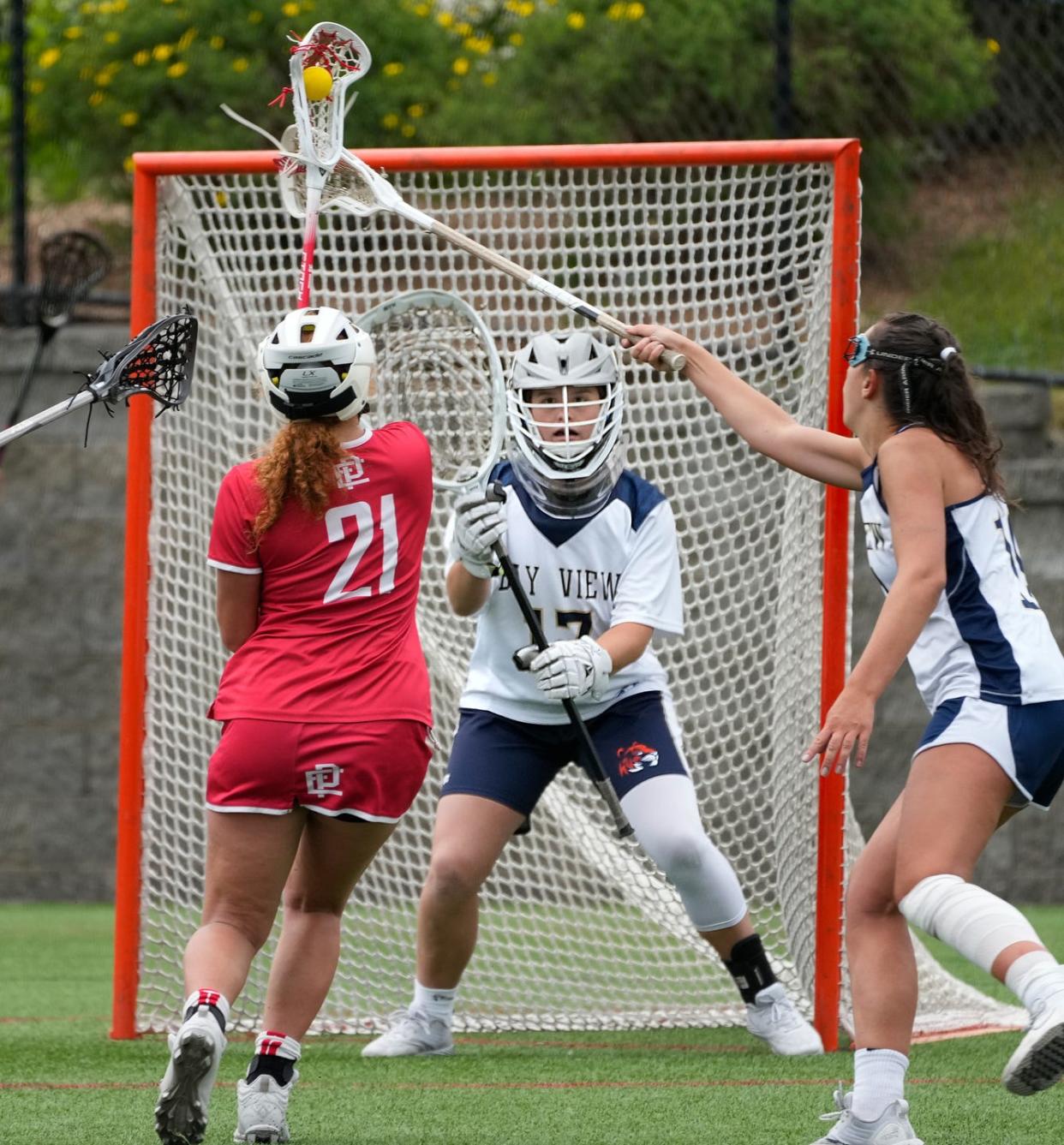 Bay View goalie Kate Shields waits for an incoming shot by Townie Kenna Wigginton in overtime. 