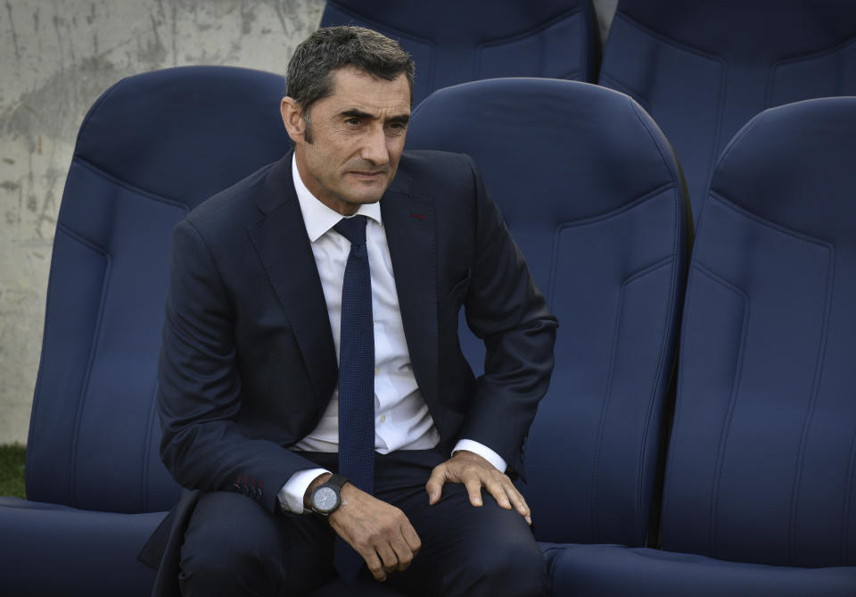 FC Barcelona's head coach Ernesto Valverde looks on prior to the start of the Spanish La Liga soccer match between Real Sociedad and FC Barcelona at the Anoeta stadium, in San Sebastian, northern Spain, Saturday, Sept. 15, 2018. (AP Photo/Jose Ignacio Unanue)