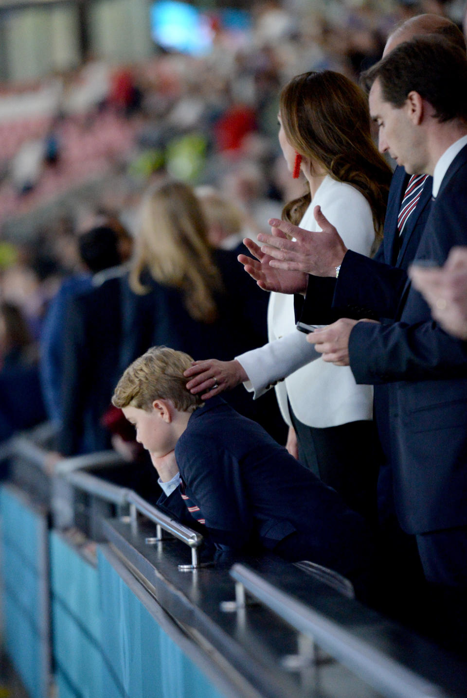 LONDON, ENGLAND - JULY 11: Prince George of Cambridge, Catherine, Duchess of Cambridge, and Prince William, Duke of Cambridge and President of the Football Association (FA) are seen in the stands prior to the UEFA Euro 2020 Championship Final between Italy and England at Wembley Stadium on July 11, 2021 in London, England. (Photo by Eamonn McCormack - UEFA/UEFA via Getty Images)
