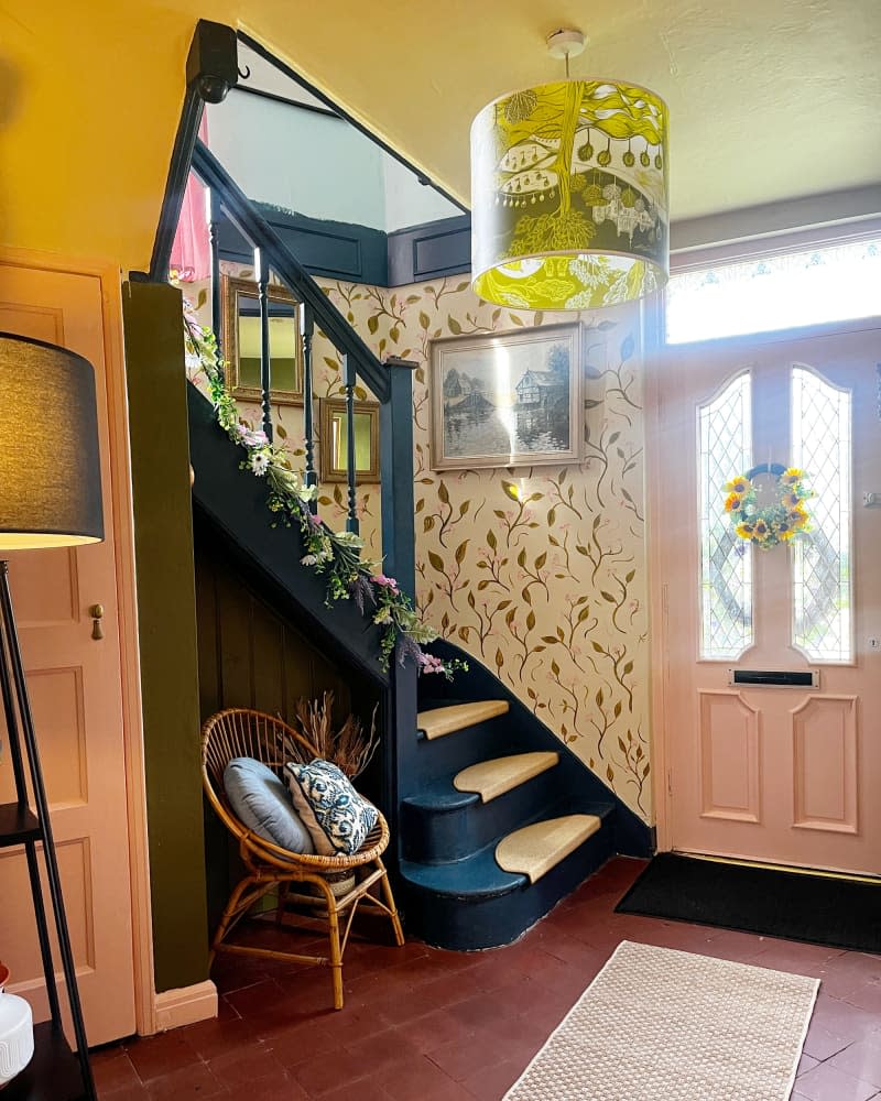 Pink door in entry of home.