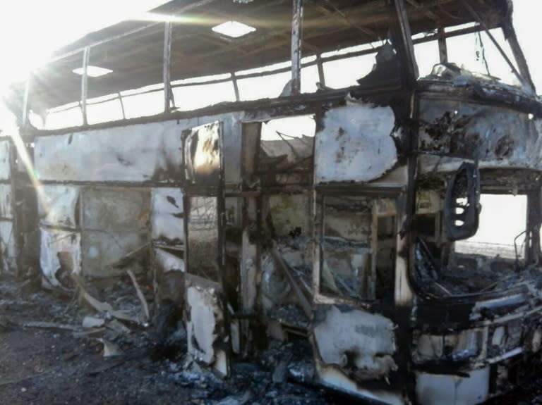 The fire spread very quickly, gutting the bus and killing 52 of the 57 people on board, Kazakh officials said