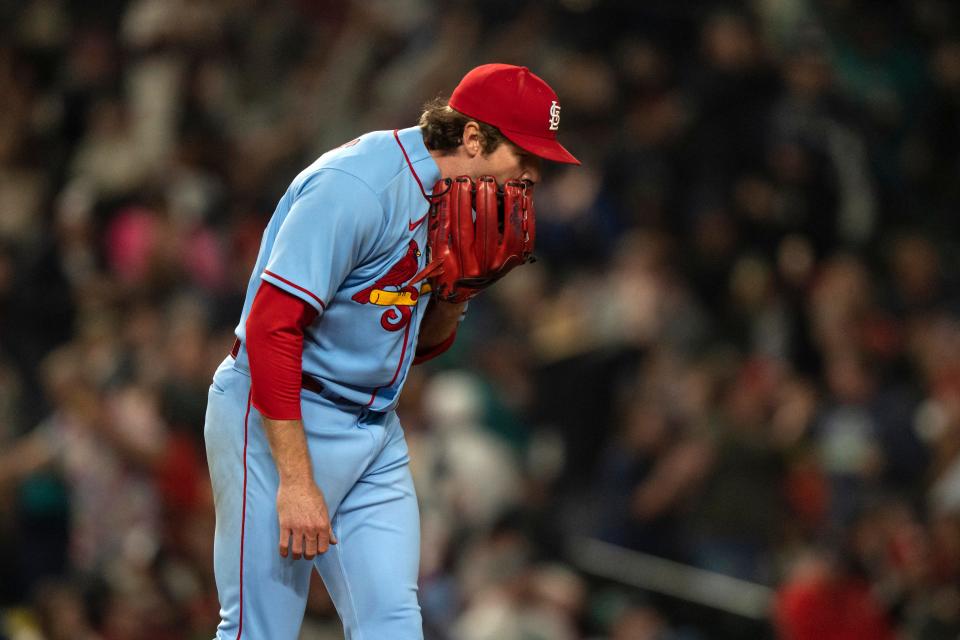 Cardinals starter Miles Mikolas reacts after giving up a home run.