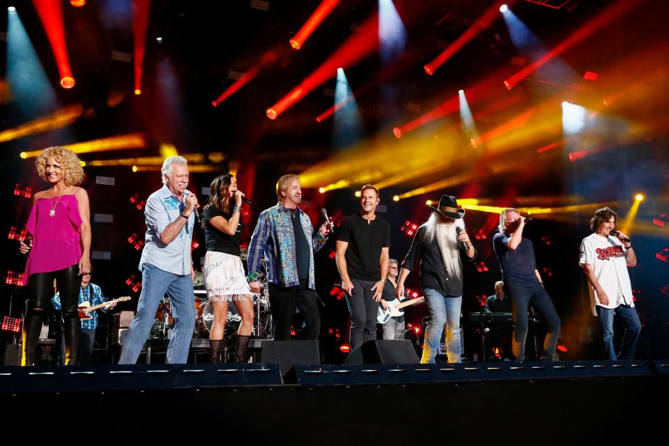 The Oak Ridge Boys team up with Little Big Town to sing the Boys' hit, "Elvira," at LP Field during the CMA Music Fest June 12, 2015.