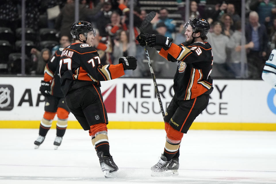 Anaheim Ducks right wing Frank Vatrano, left, celebrates his game-winning goal with center Mason McTavish overtime of an NHL hockey game against the San Jose Sharks Wednesday, Jan. 31, 2024, in Anaheim, Calif. (AP Photo/Mark J. Terrill)