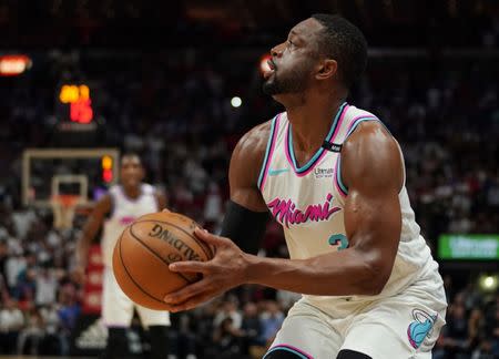 Feb 27, 2018; Miami, FL, USA; Miami Heat guard Dwyane Wade (3) shoots the ball against the Philadelphia 76ers during the first half at American Airlines Arena. Mandatory Credit: Jasen Vinlove-USA TODAY Sports