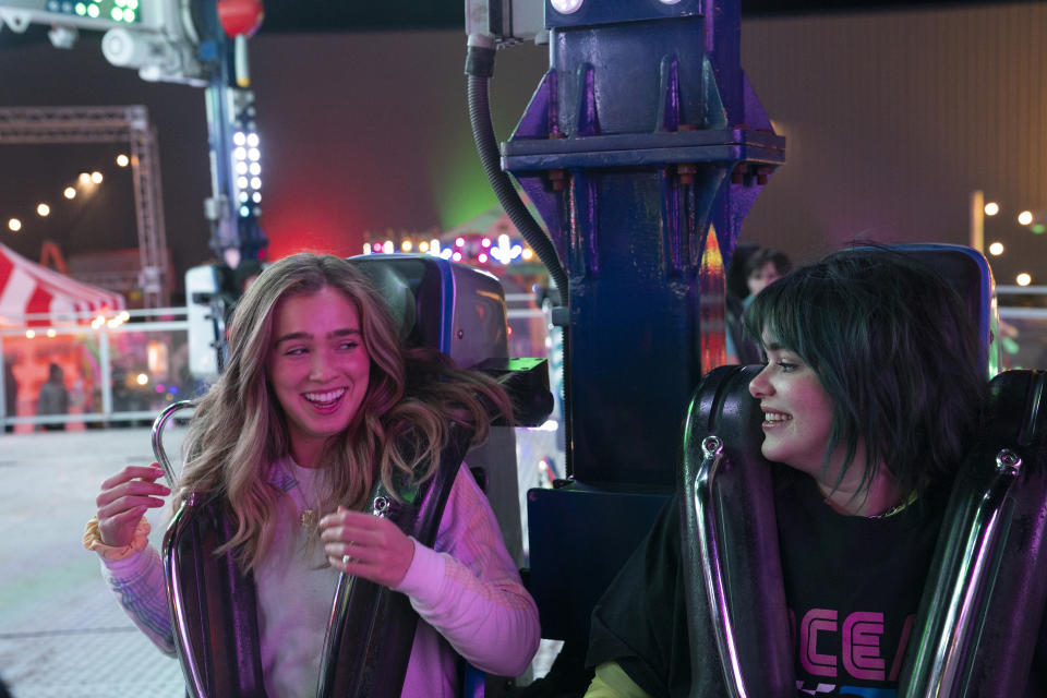 This image released by HBO Max shows Haley Lu Richardson, left, and Barbie Ferreira in a scene from "Unpregnant." (Ursula Coyote/HBO Max via AP)