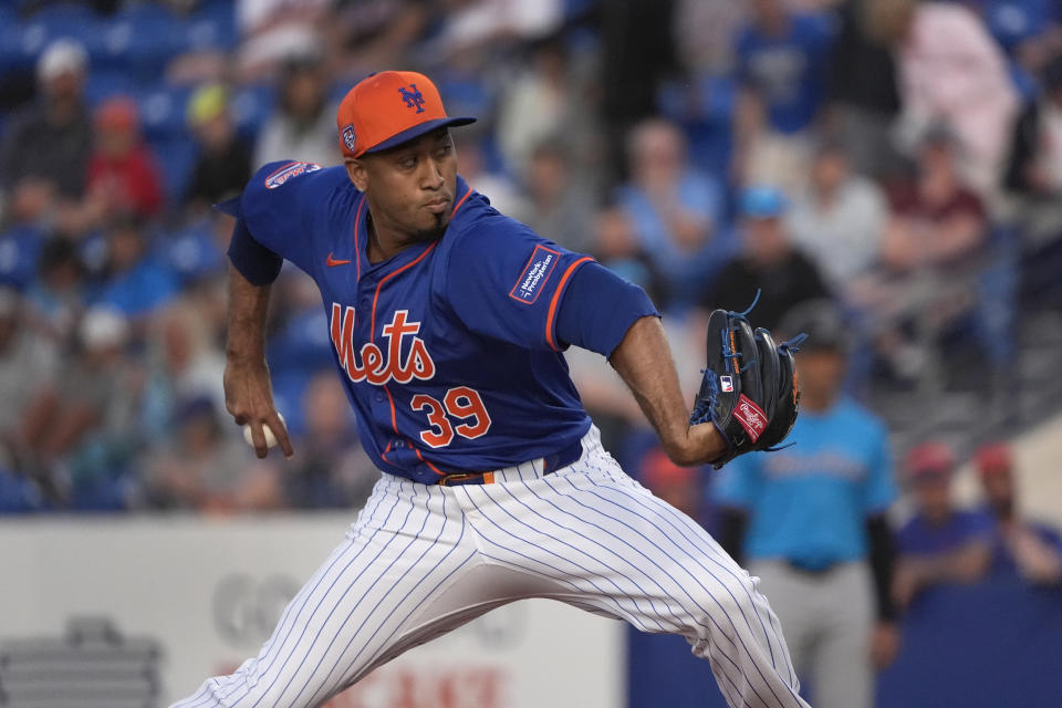 New York Mets pitcher Edwin Diaz throws during the fifth inning of a spring training baseball game against the Miami Marlins Monday, March 11, 2024, in Port St. Lucie, Fla. (AP Photo/Jeff Roberson)