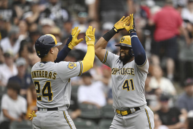 Santana's 3-run homer in the 7th leads Brewers past Rangers in