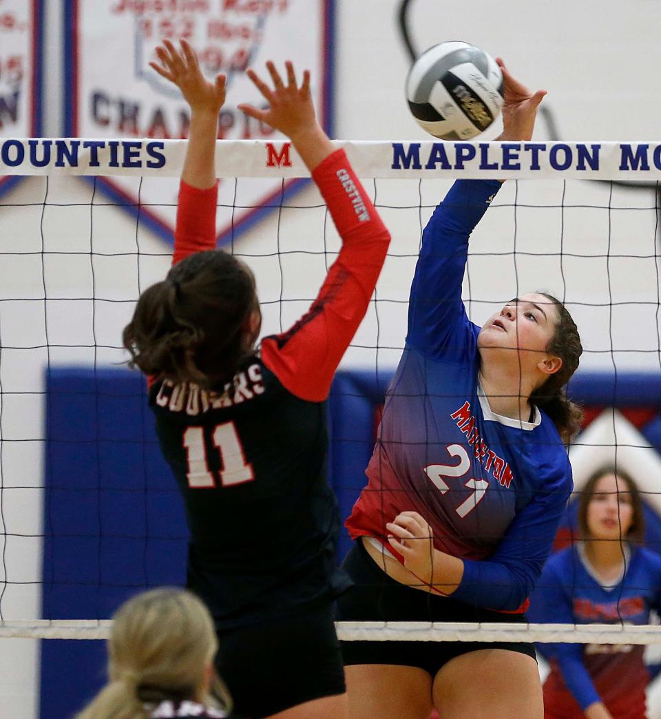 Mapleton senior Bre McKean (21) collapsed and died on the football field Friday night during homecoming activities. McKean was a member of the girls volleyball and basketball teams.
