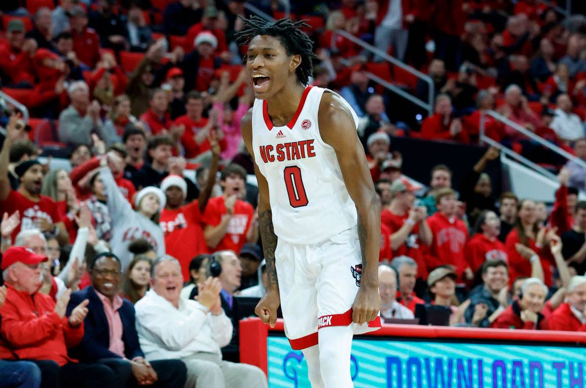 N.C. State’s Terquavion Smith (0) celebrates hitting a three-pointer during the second half of N.C. State’s 76-64 victory over Louisville at PNC Arena in Raleigh, N.C., Thursday, Dec. 22, 2022.