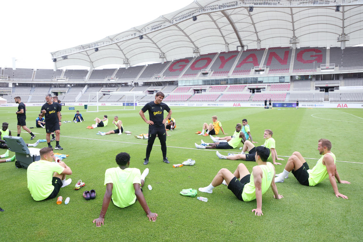 Tottenham manager Antonio Conte talking to his players during their training session at Goyang Stadium on South Korea. 