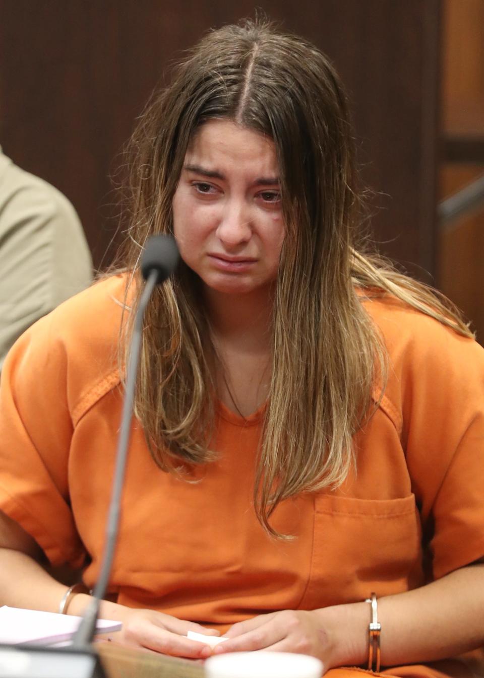 Sydney Powell waits for her sentencing in Summit County Common Pleas Judge Kelly McLaughlin's courtroom. Powell was sentence to 15 to life for the stabbing death of her mother.