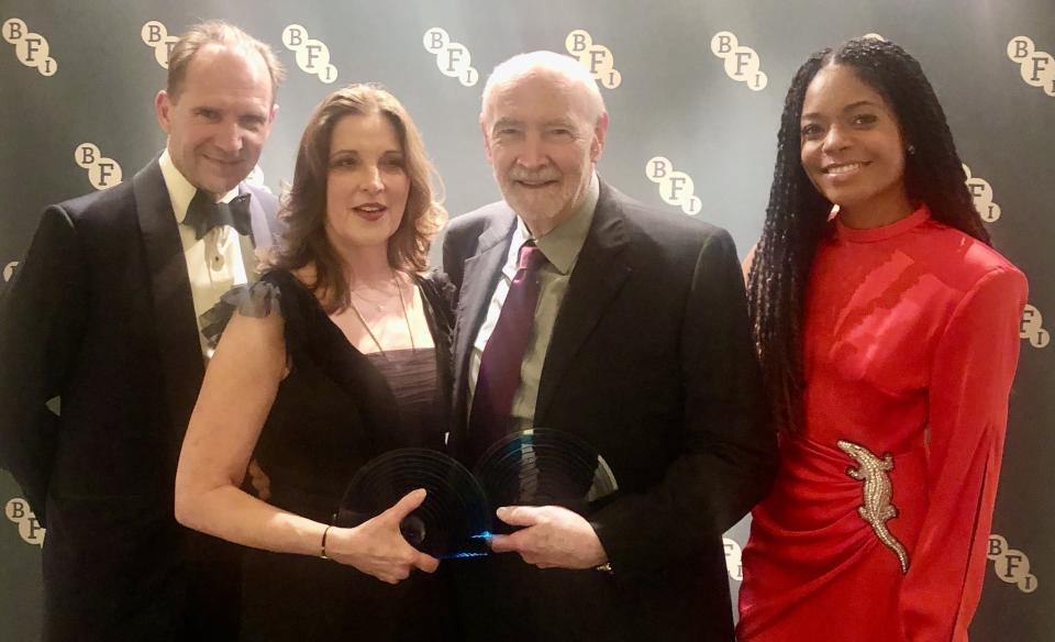 Bond love-fest: Ralph Fiennes, Barbara Broccoli, Michael G. Wilson and Naomie Harris at BFI Chair’s Dinner - Credit: Bamigboye/Deadline