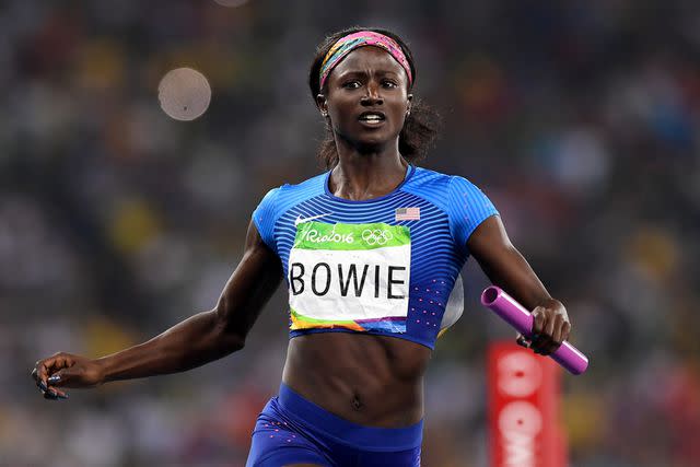 <p>Quinn Rooney/Getty </p> Tori Bowie of the United States reacts after crossing the finishline to win the Women's 4 x 100m Relay Final on Day 14 of the Rio 2016 Olympic Games at the Olympic Stadium on August 19, 2016 in Rio de Janeiro, Brazil.