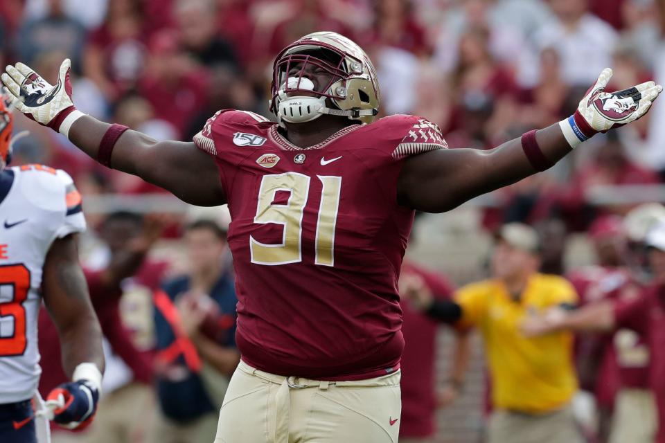 Florida State Seminoles defensive tackle Robert Cooper (91) celebrates a tackle. The Florida State Seminoles host the Syracuse Orange for the 2019 homecoming game Saturday, Oct. 26, 2019.