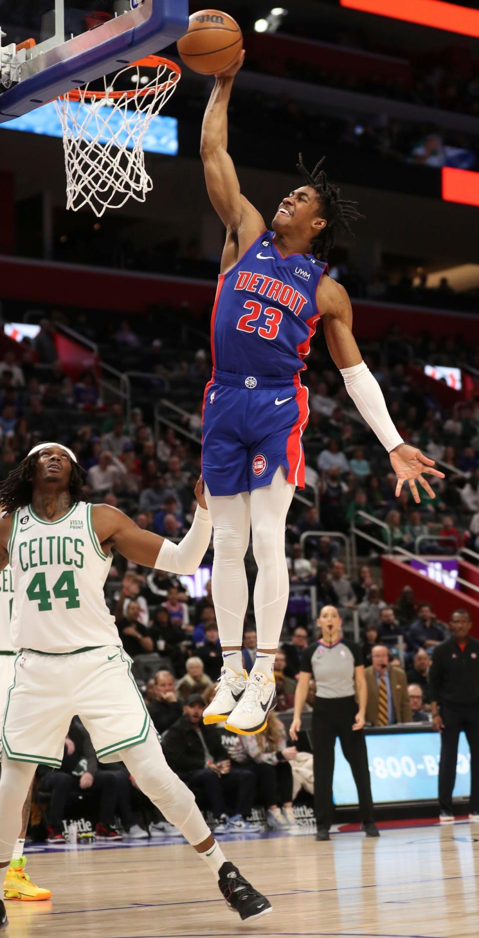 Pistons guard Jaden Ivey dunks against Celtics center Robert Williams III during the second period Monday, Feb. 6, 2023, at Little Caesars Arena.