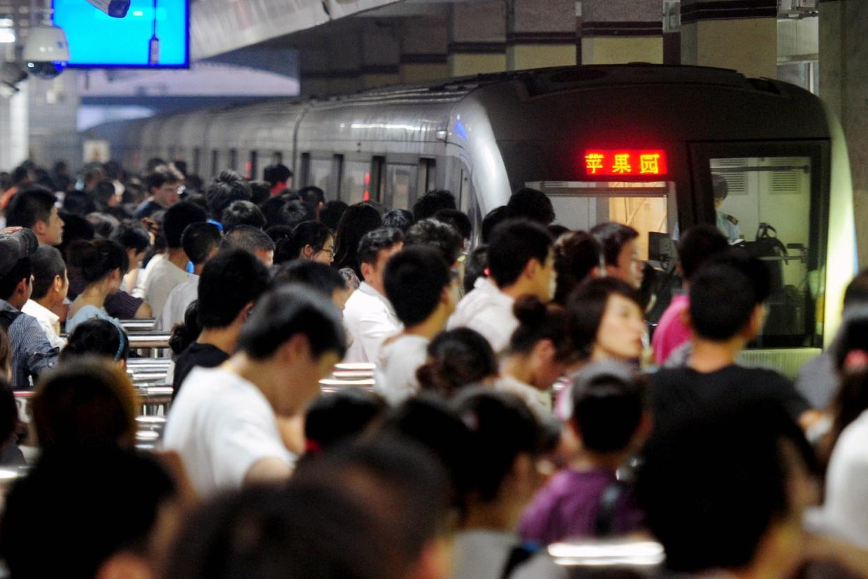 China is set to introduce measures in which it will be able to ban people from planes and trains: AFP/Getty Images