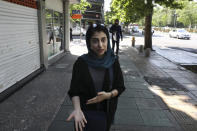 In this Friday, May 17, 2019 photo, civil servant and student Afra Hamedzadeh speaks during an interview in downtown Tehran, Iran. "Trump is not predictable at all and one doesn't know how to react to him and what is the right thing to do against him,” she says. “Since he controls the global economy we are somehow left with few options." (AP Photo/Vahid Salemi)