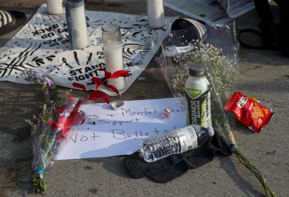 A memorial shrine for Samuel Sharpe Jr. is seen near at the scene of a officer-involved shooting near the intersection of North 14th and West Vliet streets in Milwaukee. Members of the Columbus, Ohio, police department, who were in Milwaukee to provide security for the Republican National Convention, shot and killed Sharpe on Tuesday afternoon.