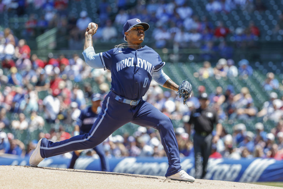 Chicago Cubs starting pitcher Marcus Stroman delivers against the St. Louis Cardinals during the first inning of a baseball game, Friday, June 3, 2022, in Chicago. (AP Photo/Kamil Krzaczynski)