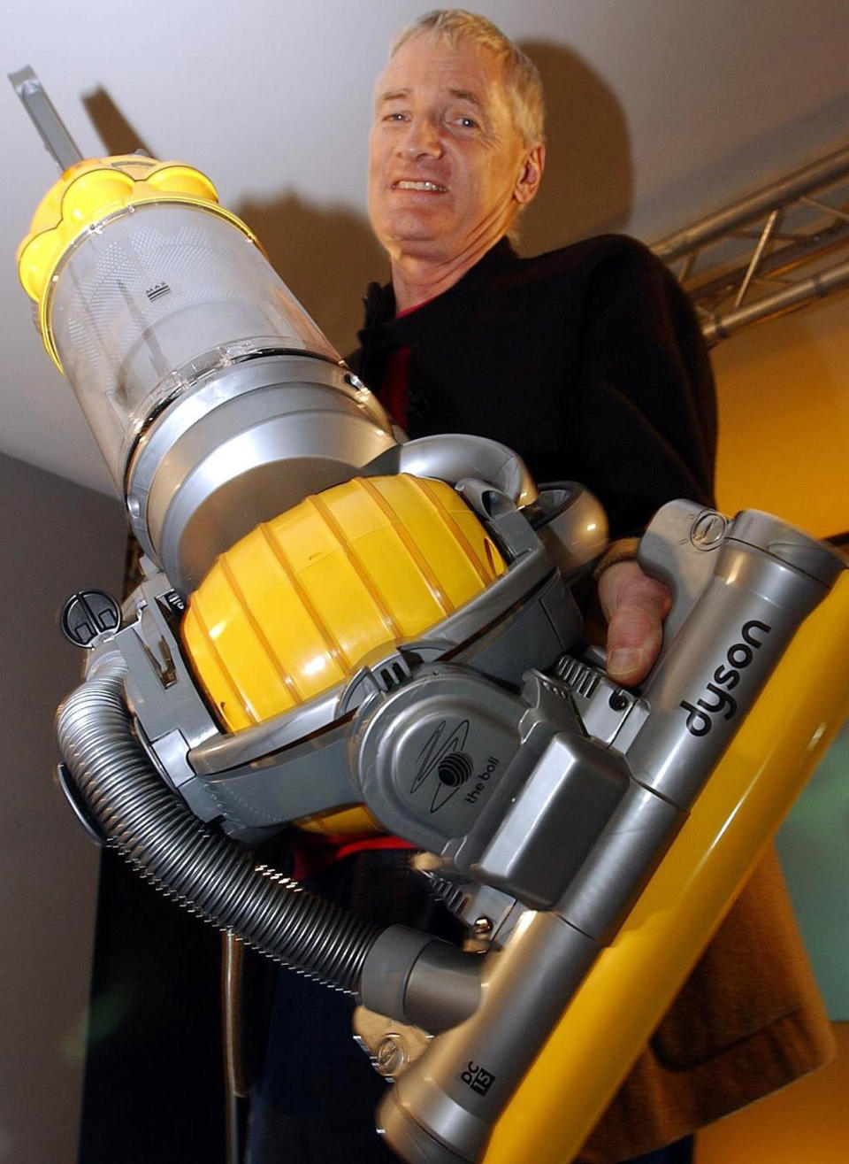 British inventor James Dyson with his new Dyson Ball vacuum cleaner during the product launch.