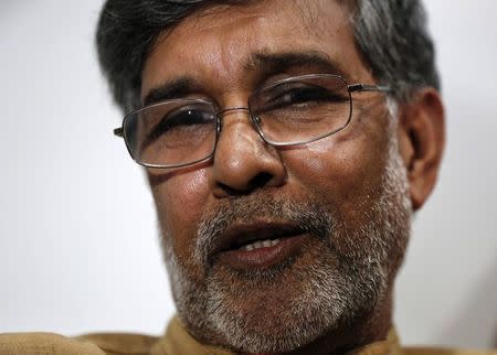 Indian children's right activist Kailash Satyarthi speaks with the media at his office in New Delhi October 10, 2014. REUTERS/Adnan Abidi