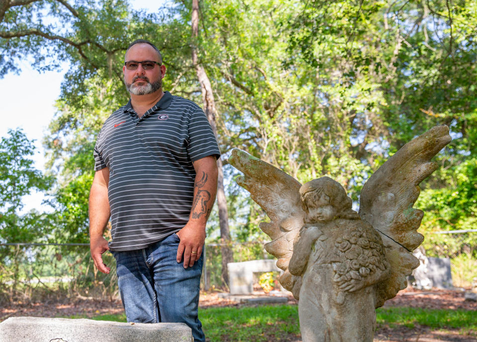 Retired Glynn County Police officer Ronald Cooper stands inside a cemetery in unincorporated Gardi, Georgia on Sunday, May 26, 2024. In November 2019, Javier Sanchez Mendoza, Jr. kidnapped a woman at knife point and drove her to the cemetery with plans of killing her.