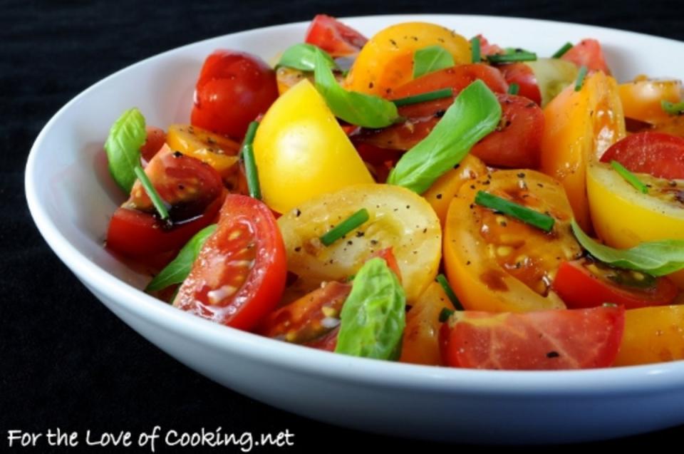 <p>There is something so delicious about fresh tomatoes with good herbs and a tasty balsamic reduction.</p><p><strong>Get the recipe: <a href="http://www.fortheloveofcooking.net/2011/08/tomato-salad-with-fresh-herbs-and.html" rel="nofollow noopener" target="_blank" data-ylk="slk:Tomato Salad with Fresh Herbs and a Balsamic Reduction;elm:context_link;itc:0;sec:content-canvas" class="link ">Tomato Salad with Fresh Herbs and a Balsamic Reduction</a></strong></p>