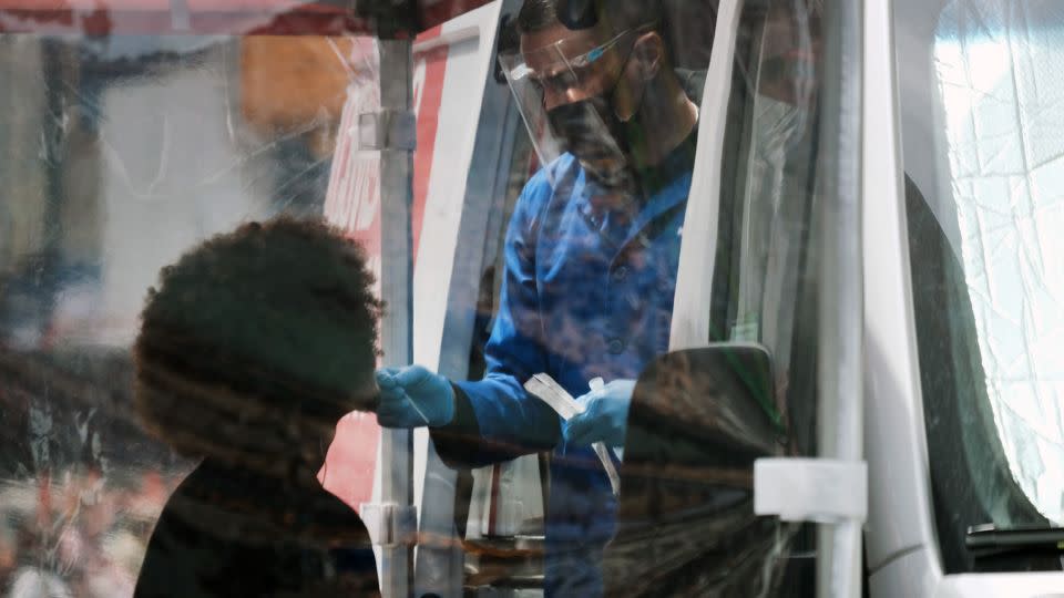 A person is tested at a Covid-19 testing van in New York's Times Square on May 3, 2022. - Spencer Platt/Getty Images