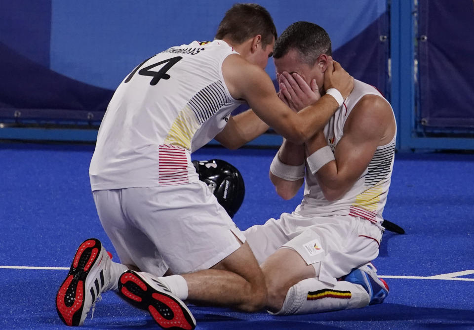 Belgium's Augustin Jean J Meurmans (14) and Belgium's John-John Dominique M Dohmen (7) celebrate after defeating Australia in a men's field hockey gold medal match at the 2020 Summer Olympics, Thursday, Aug. 5, 2021, in Tokyo, Japan. (AP Photo/John Locher)