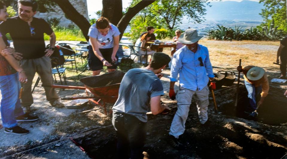 Joe Wagman, second from right, during a dig in Greece.