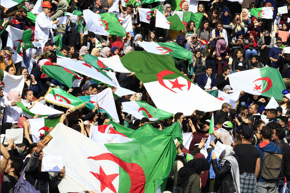 Hundreds of students gather in central Algiers to protest Algerian President Abdelaziz Bouteflika's decision to seek fifth term, Tuesday, March 6, 2019. Algerian students are gathering for new protests and are calling for a general strike if he doesn't meet their demands this week. (AP Photo/Toufik Doudou)