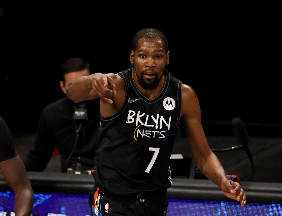 NEW YORK, NEW YORK - FEBRUARY 05:  Kevin Durant #7 of the Brooklyn Nets celebrates his three point shot in the second quarter against the Toronto Raptors at Barclays Center on February 05, 2021 in New York City. NOTE TO USER: User expressly acknowledges and agrees that, by downloading and or using this photograph, User is consenting to the terms and conditions of the Getty Images License Agreement. (Photo by Elsa/Getty Images)