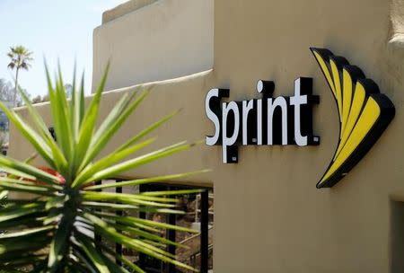 The logo of U.S. mobile network operator Sprint Corp is seen at a Sprint store in San Marcos, California August 3, 2015. REUTERS/Mike Blake /File Photo
