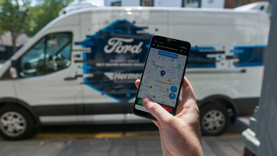 Pedestrian couriers will interact with the van via a smartphone app. Photo: Ford