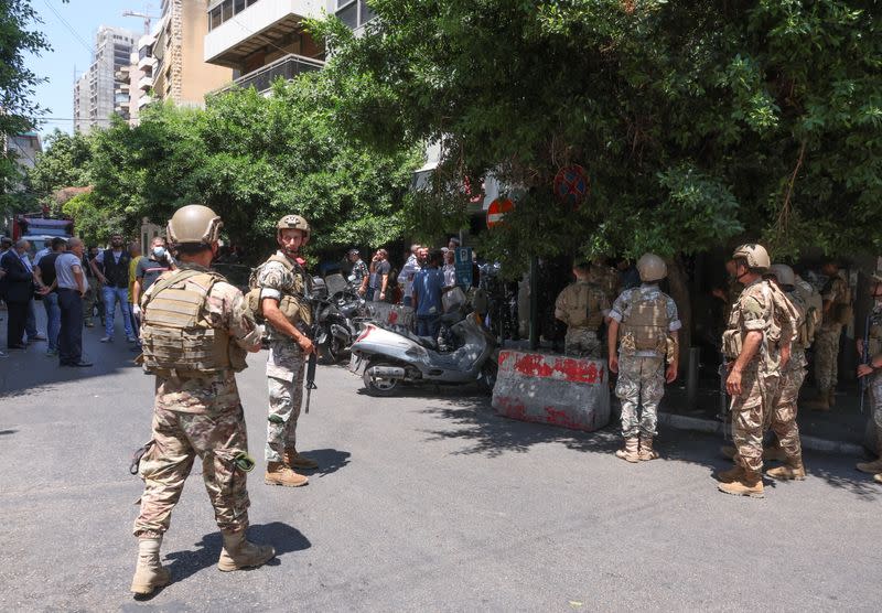 Members of Lebanese army secure the area outside Federal bank in Hamra