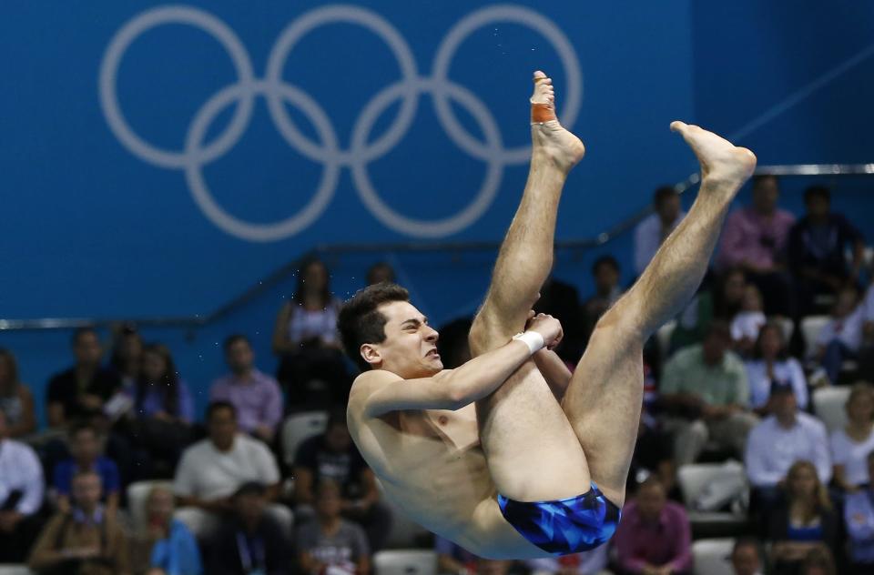 Stephan Feck of Germany misdives and injures himself forcing him to pull out of competition in the Men's 3m Springboard Preliminary for the London 2012 Olympic Games Diving competition at the Aquatic Centre in London, Great Britain, 6 August 2012. EPA/BARBARA WALTON